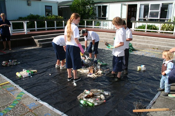 Mercury Bay Area School children sort rubbish collected from the Whitianga foreshore